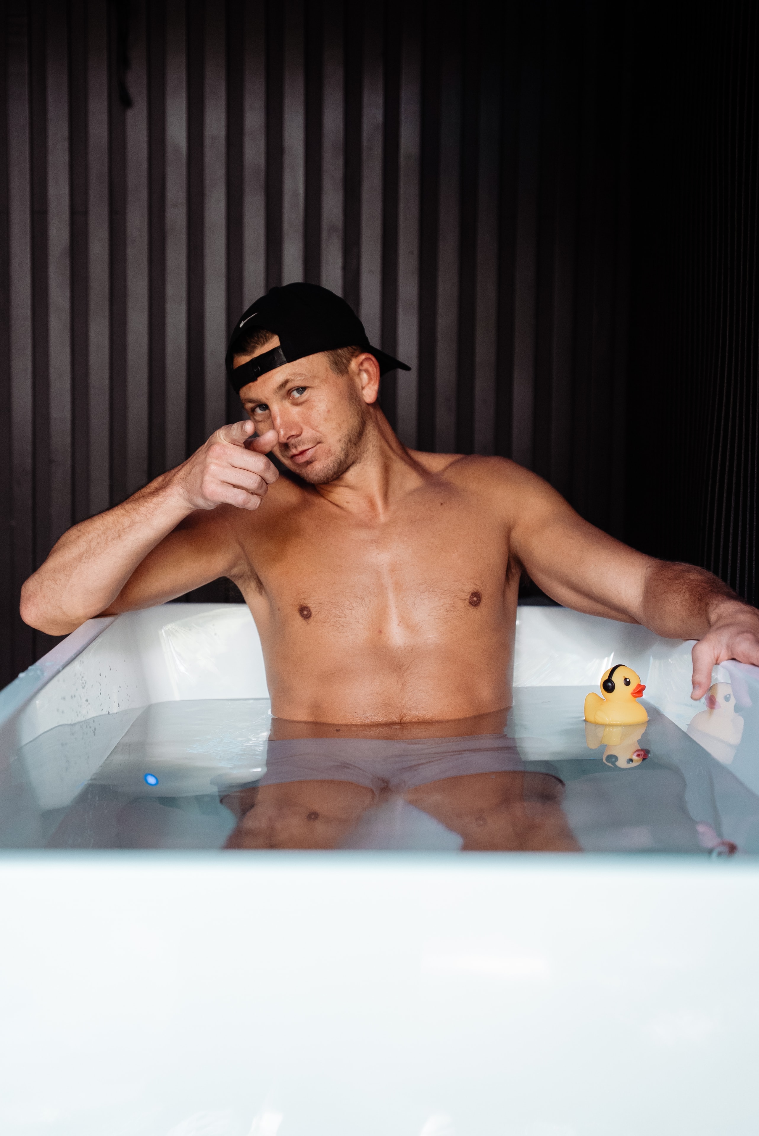 Athlete in cold plunge